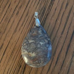 Polished stone pendant